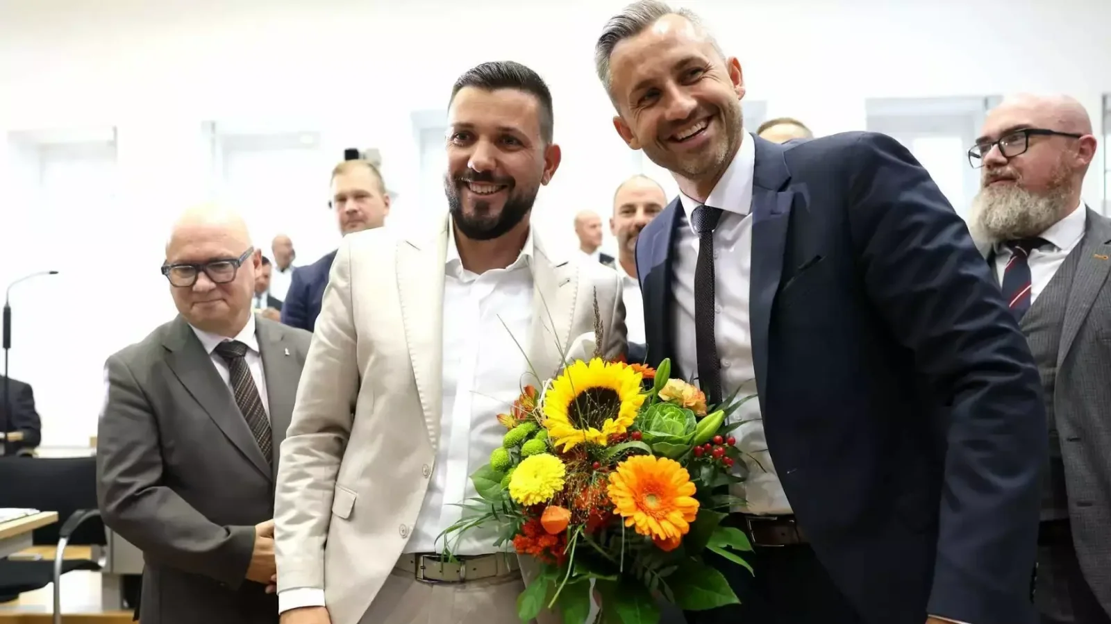 Ulrich Sigmund (középen) mellette jobbra Tobias Rausch | Kép forrása: TASR/AP